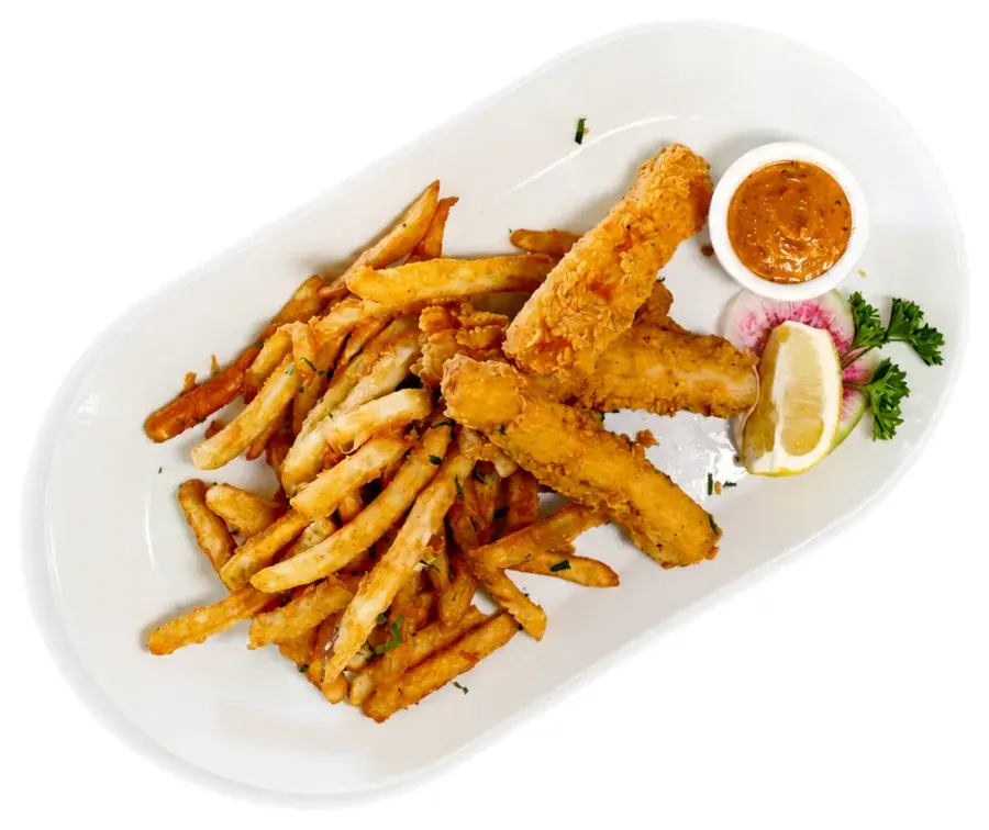 Battered fish with french fries, lemon and dipping sauce